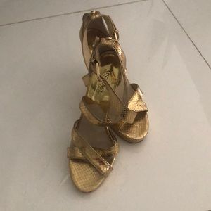 MK Golf strapped heels in size 9